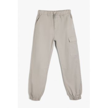 Pantaloni conici cu snur