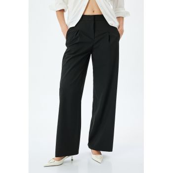 Pantaloni drepti cu buzunare oblice