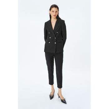 Pantaloni conici capri