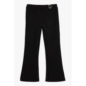 Pantaloni evazati cu detaliu metalic