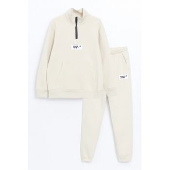 Set de bluza cu fenta cu fermoar si pantaloni de trening cu model uni - 2 piese