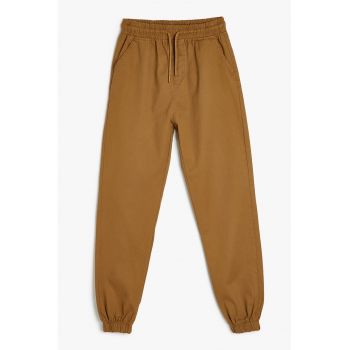 Pantaloni conici din denim