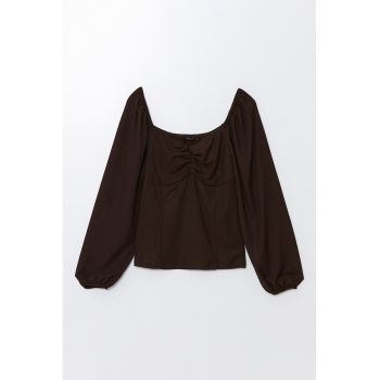 Bluza cu model uni si maneci bufante