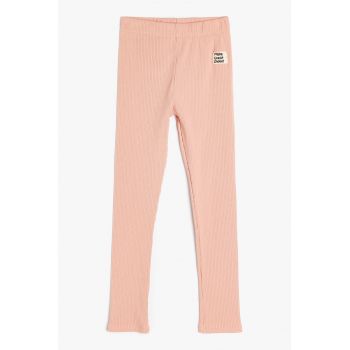 Pantaloni striati cu text aplicat