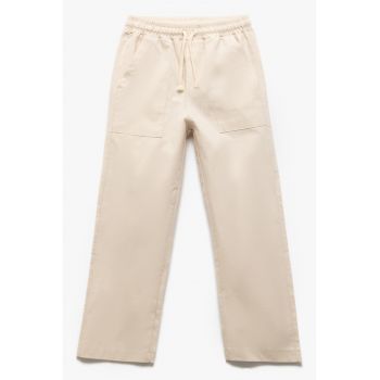 Pantaloni ampli cu snur
