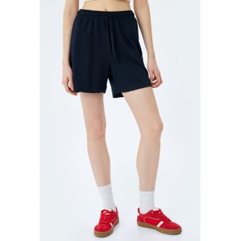 Pantaloni scurti cu buzunare laterale si talie inalta