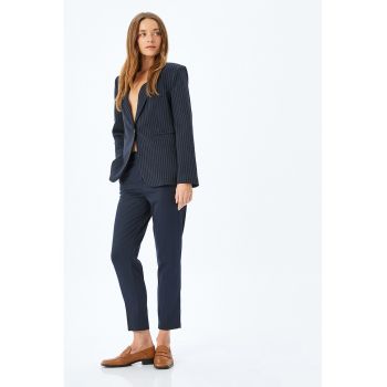 Pantaloni conici capri