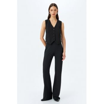 Pantaloni uni evazati