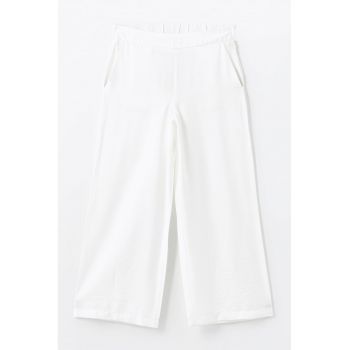 Pantaloni cu croiala ampla si buzunare oblice