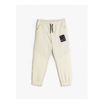 Pantaloni de trening cu buzunare laterale