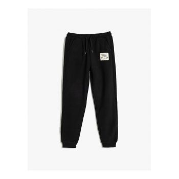Pantaloni de trening cu buzunare oblice