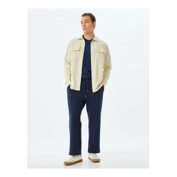 Pantaloni drepti cu aspect striat