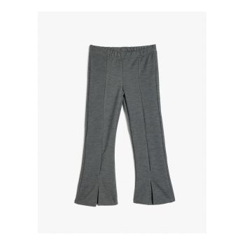 Pantaloni evazati cu slituri frontale
