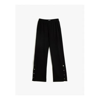 Pantaloni relaxed fit cu detalii cu capse