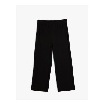 Pantaloni striati cu croiala ampla