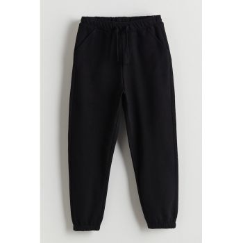 Pantaloni de trening cu buzunare oblice