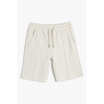 Pantaloni scurti cu snur si buzunare laterale