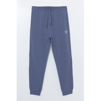 Pantaloni de trening cu model uni si talie elastica