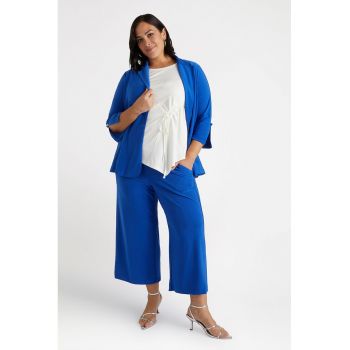 Pantaloni crop cu croiala ampla