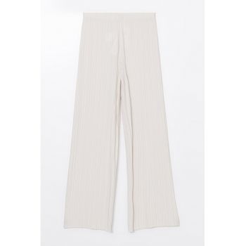 Pantaloni striati cu croiala ampla