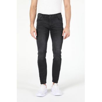 Blugi skinny cu aspect usor decolorat
