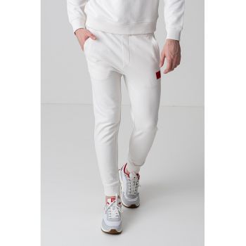Pantaloni de trening cu buzunare oblice Doak