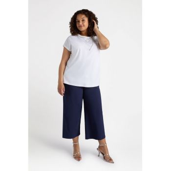 Pantaloni uni capri