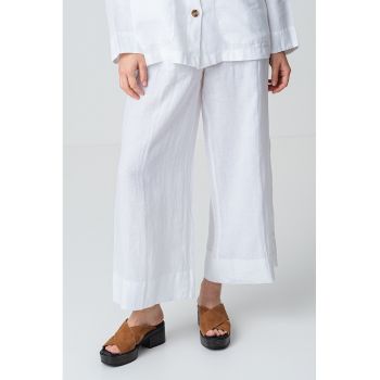 Pantaloni de in cu croiala ampla si pliuri frontale
