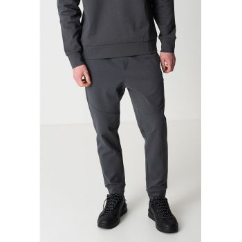 Pantaloni de trening cu model uni si snur de ajustare