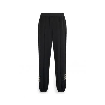 Pantaloni conici de trening