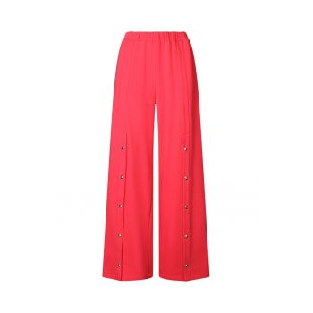 Pantaloni cu croiala ampla si buzunare cu capse