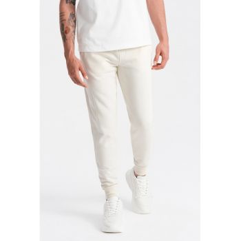 Pantaloni de trening din bumbac cu buzunare laterale