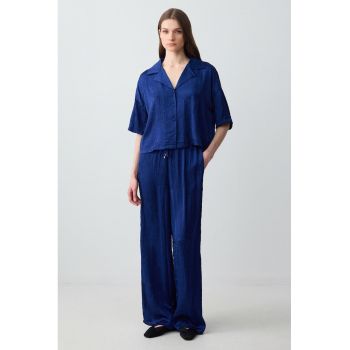 Pantaloni vaporosi cu talie inalta