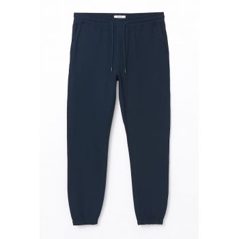 Pantaloni cu snur de ajustare si buzunare