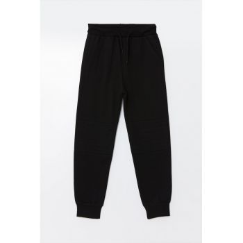 Pantaloni de trening cu buzunare oblice