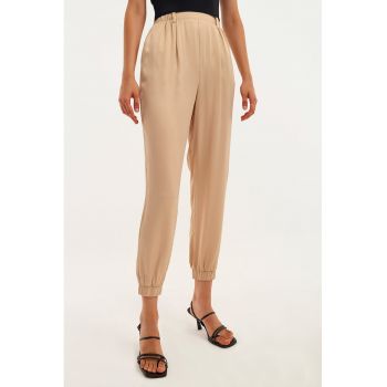 Pantaloni uni conici