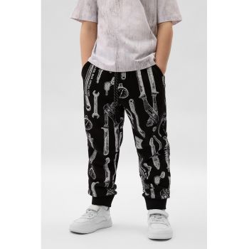 Pantaloni cu imprimeu si snururi de ajustare