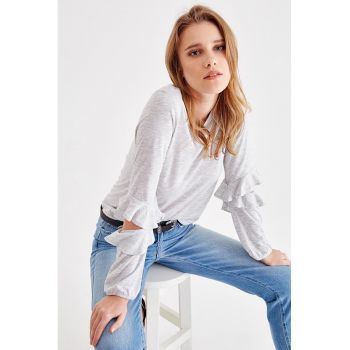 Bluza cu decupaje la nivelul coatelor