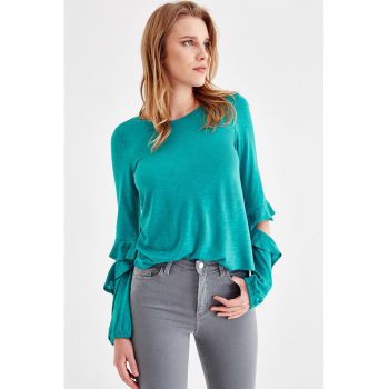 Bluza cu decupaje la nivelul coatelor