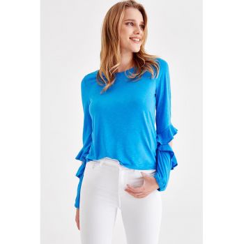 Bluza cu decupaje la nivelul coatelor