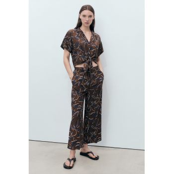 Pantaloni palazzo cu model