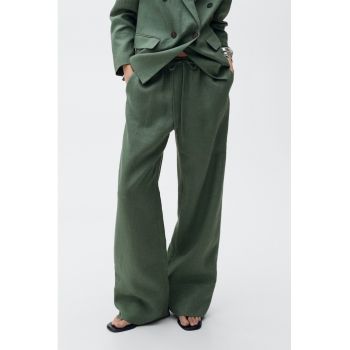 Pantaloni din in cu croiala ampla si snur de ajustare