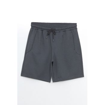 Pantaloni scurti cu talie ajustabila si buzunare frontale