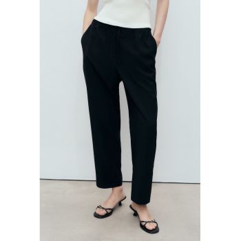 Pantaloni largi cu model uni si snur de ajustare in talie