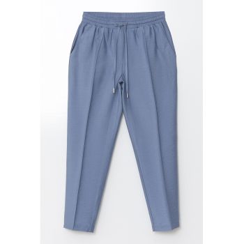 Pantaloni conici cu buzunare laterale