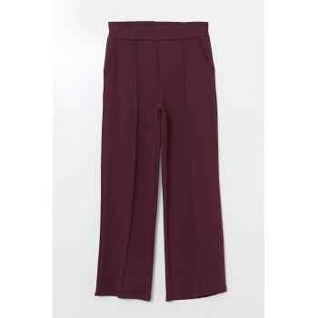 Pantaloni cu talie elastica si detaliu cu pensa