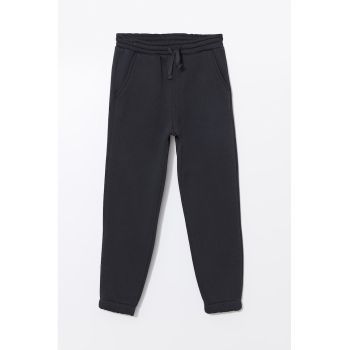 Pantaloni de trening cu snur de ajustare si buzunare oblice