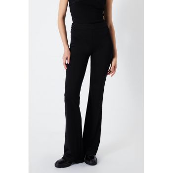 Pantaloni uni evazati