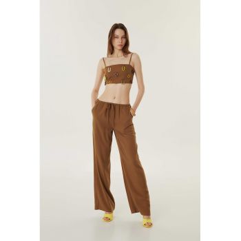 Pantaloni din amestec de lyocell cu croiala ampla