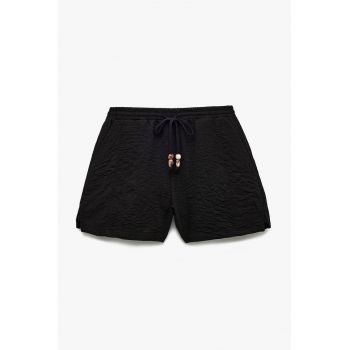 Pantaloni texturati cu snur